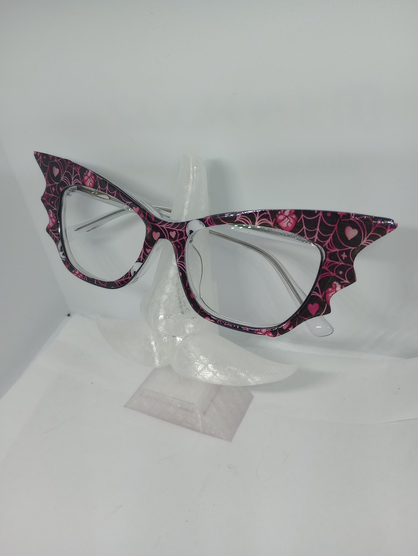 Pink spider webs bat topper. Can be made in any style.